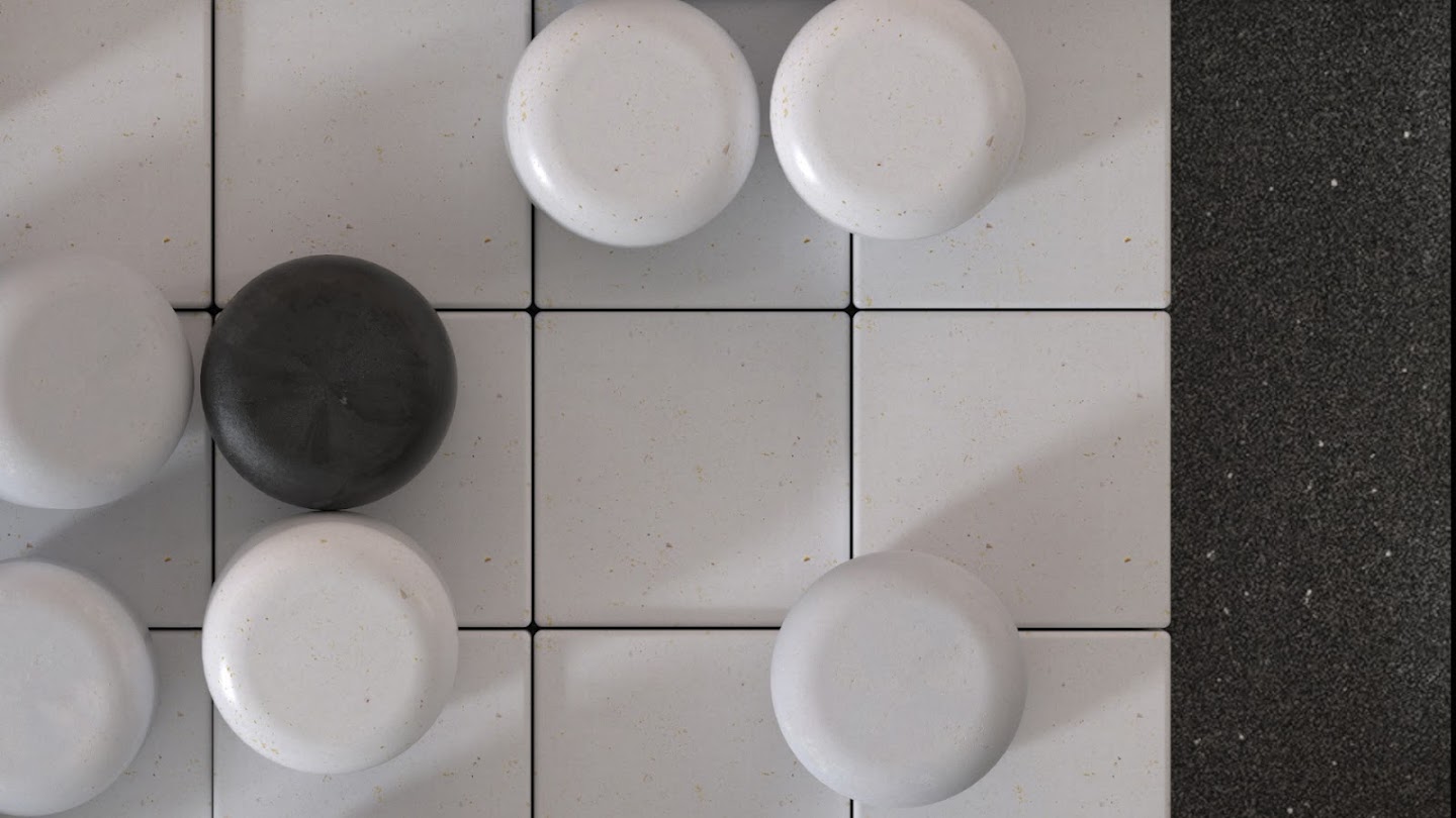 A Go board – a wide grid with black and white stones placed on top.