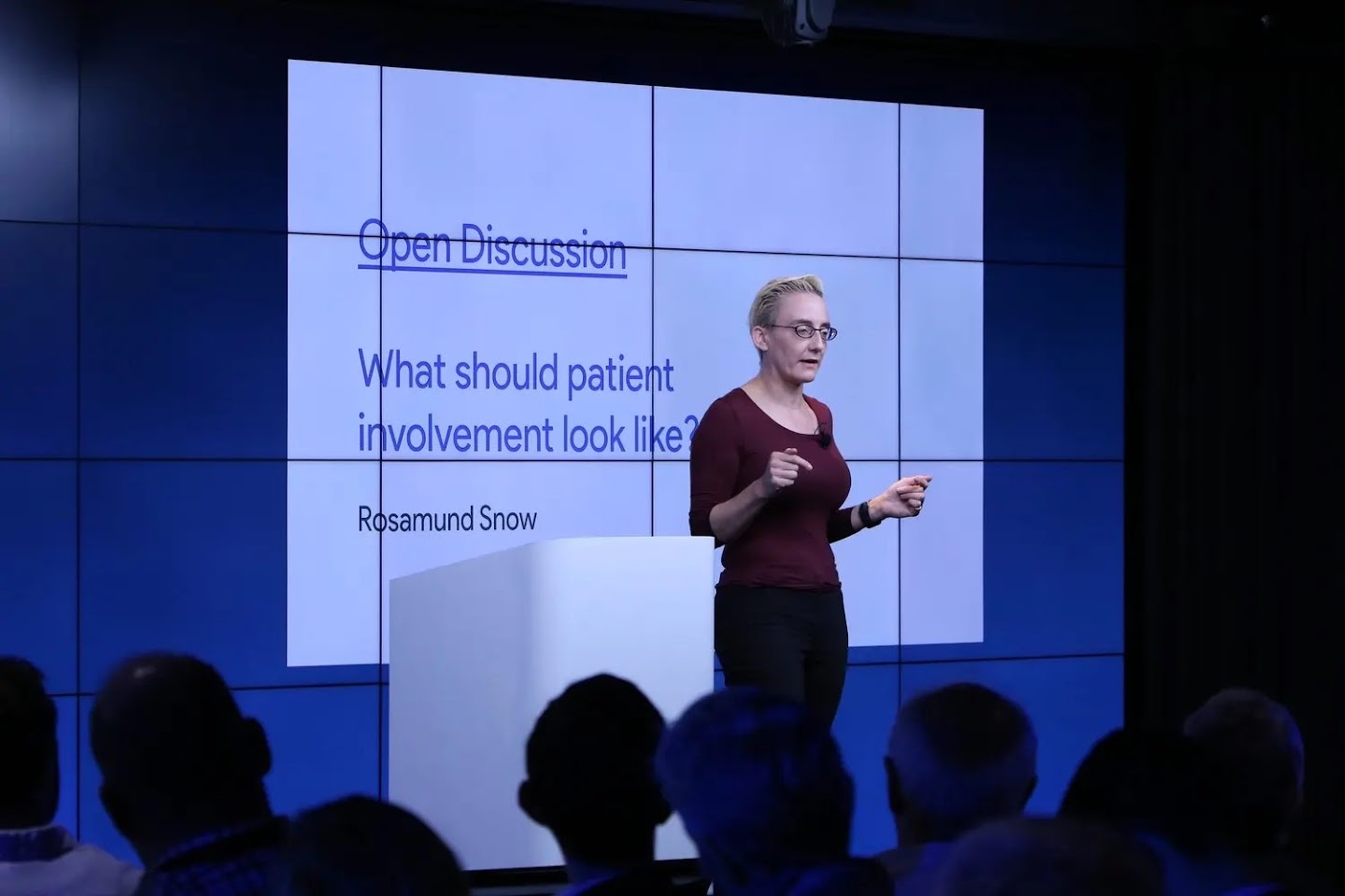 Rosamund Snow chairing a debate on patient involvement in medical care.